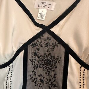 The Loft, black and white tank